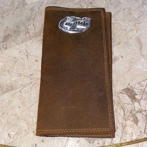 Brown Leather checkbook wallet with the Florida Gator Logo metal oval